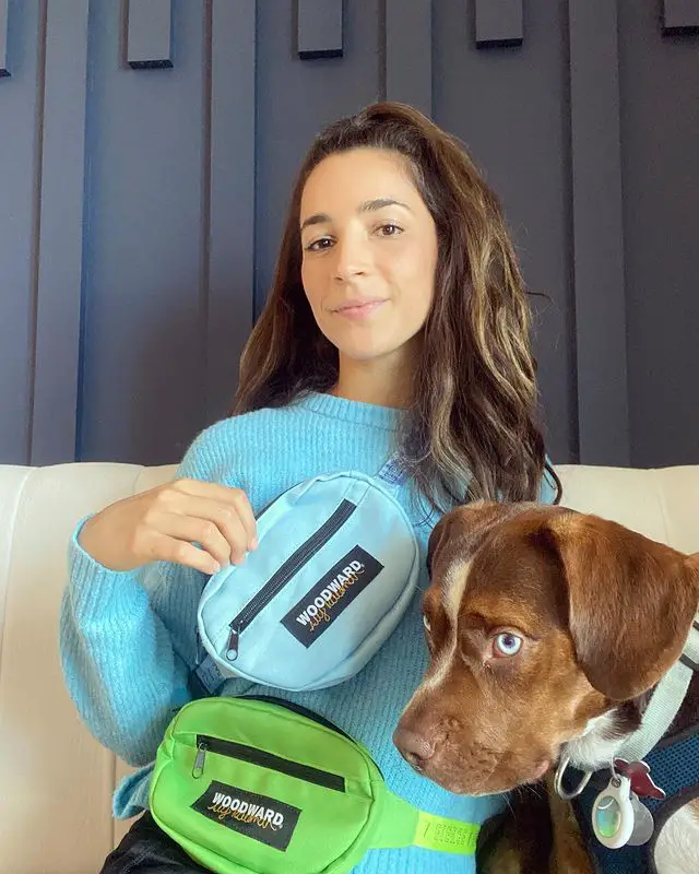 Gymnast Aly Raisman, who was previously dating Colton Underwood, and her dog. 