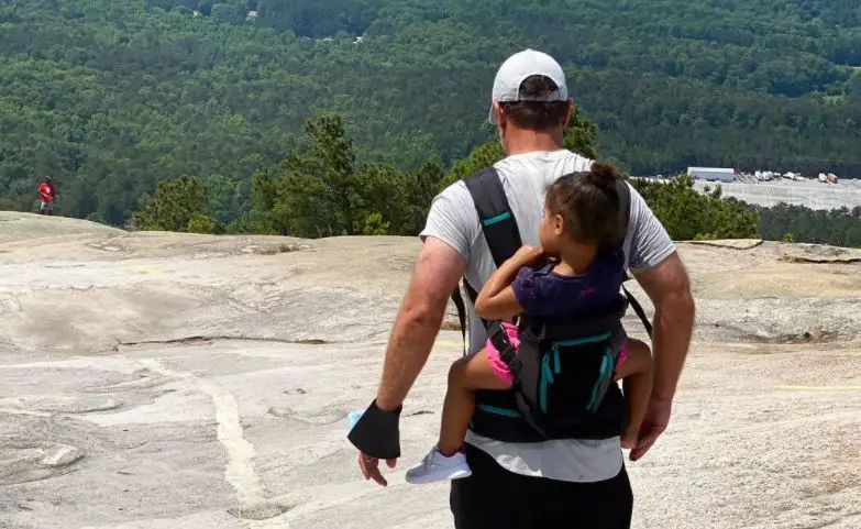 Brian Musso and his daughter on a hike 