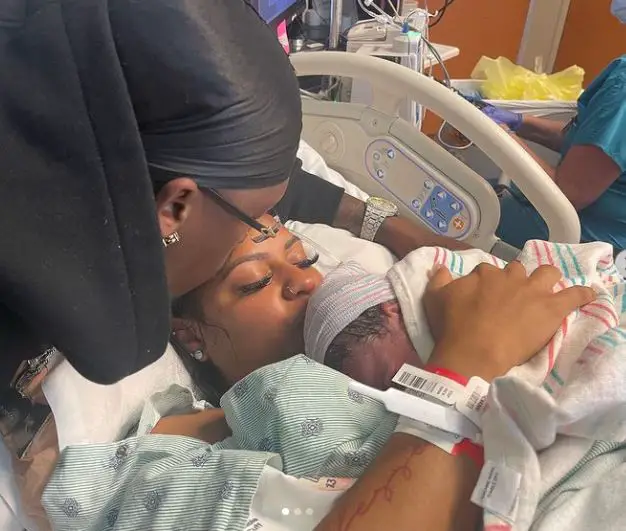 Carmen and Cory with their baby