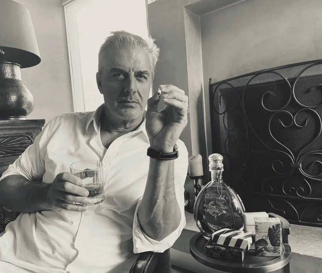 Chris Noth with his tequila brand, Ambhar. 