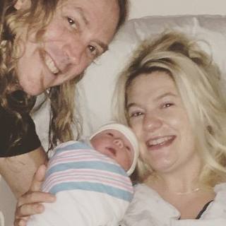 Danny and Rynne with their son Zola Carey
