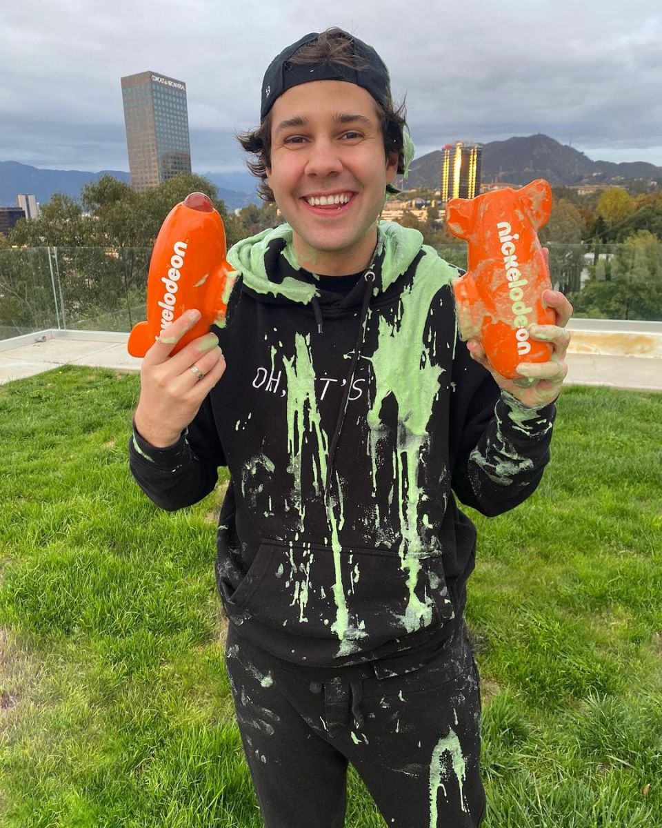 David Dobrik posing with his Kids' Choice Awards.