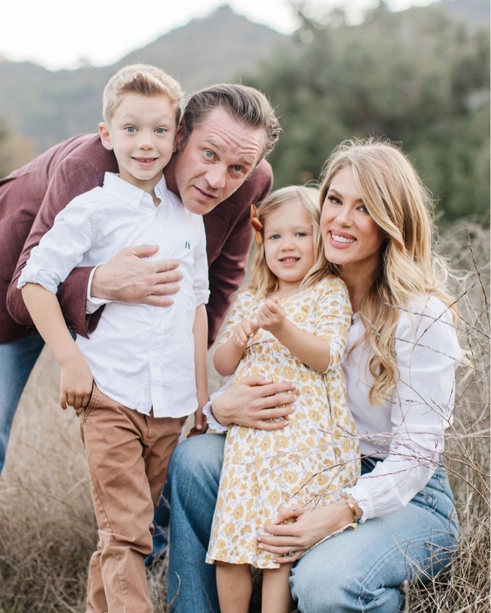 Devon Sawa and his wife, Dawni Sahanovitch, posing for a picture with their children