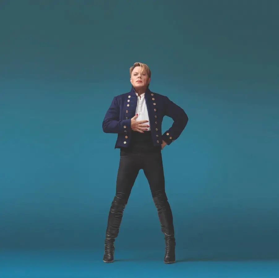 Eddie Izzard posing to promote her show