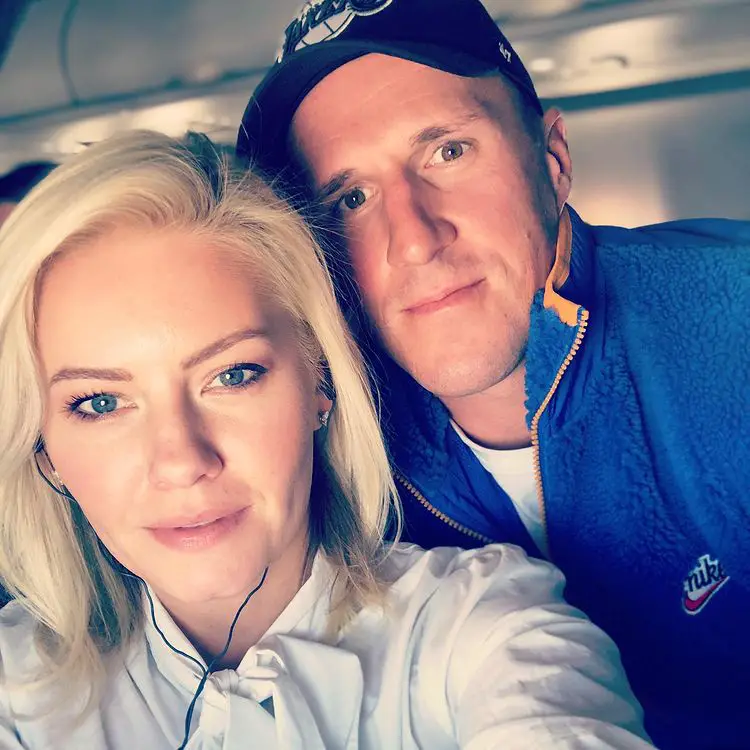 Elisha Cuthbert and her husbandÂ Dion Phaneuf posing for a selfie.