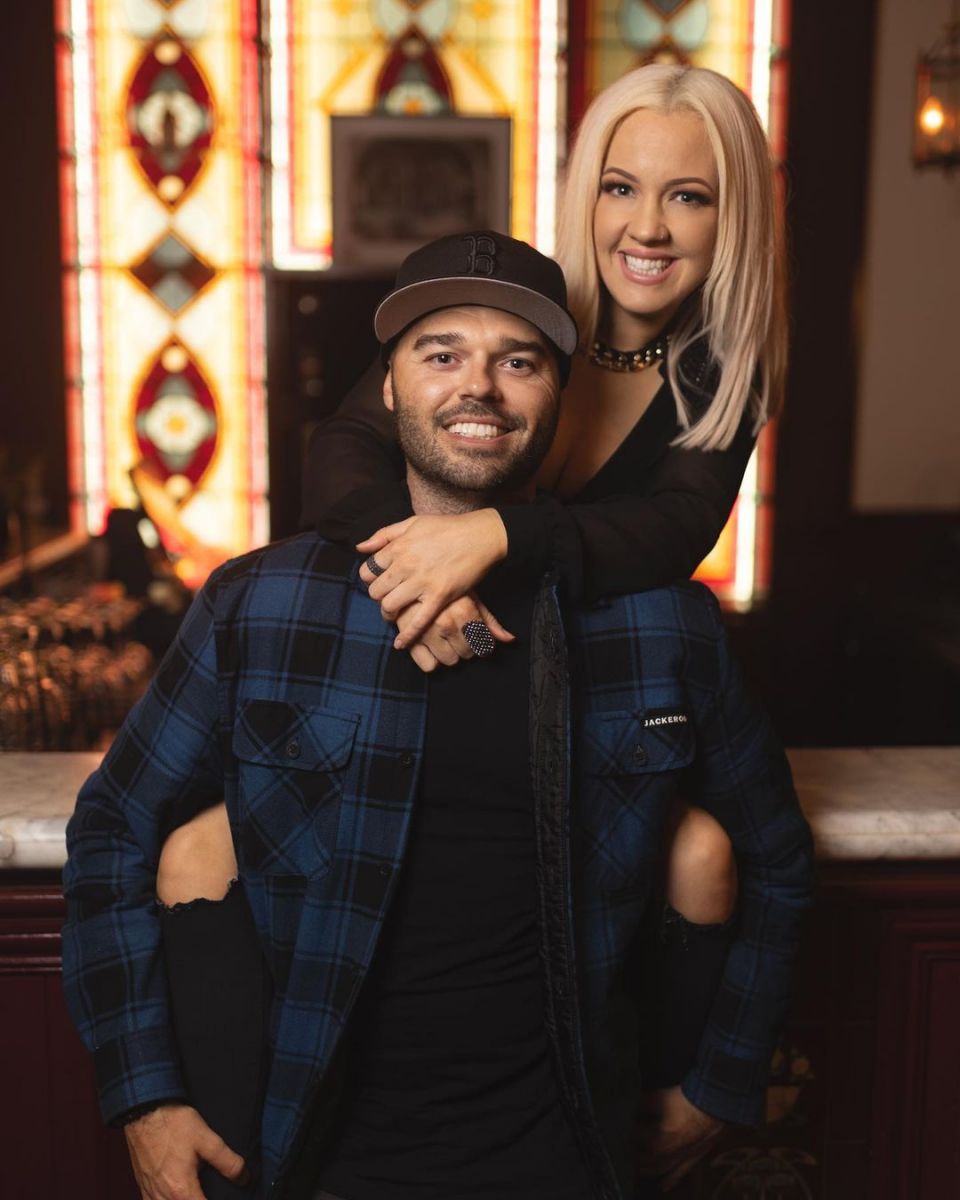 Ella Bee and Blake Proud posing for a photo