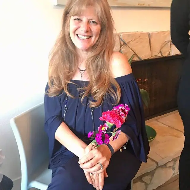 Eric Robert's wife Eliza Roberts, pictured smiling.