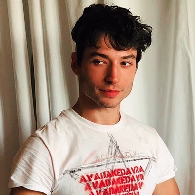 Ezra Miller's fans and other Twitter users are outraged by major outlets' failure to use their preferred they/them pronouns.