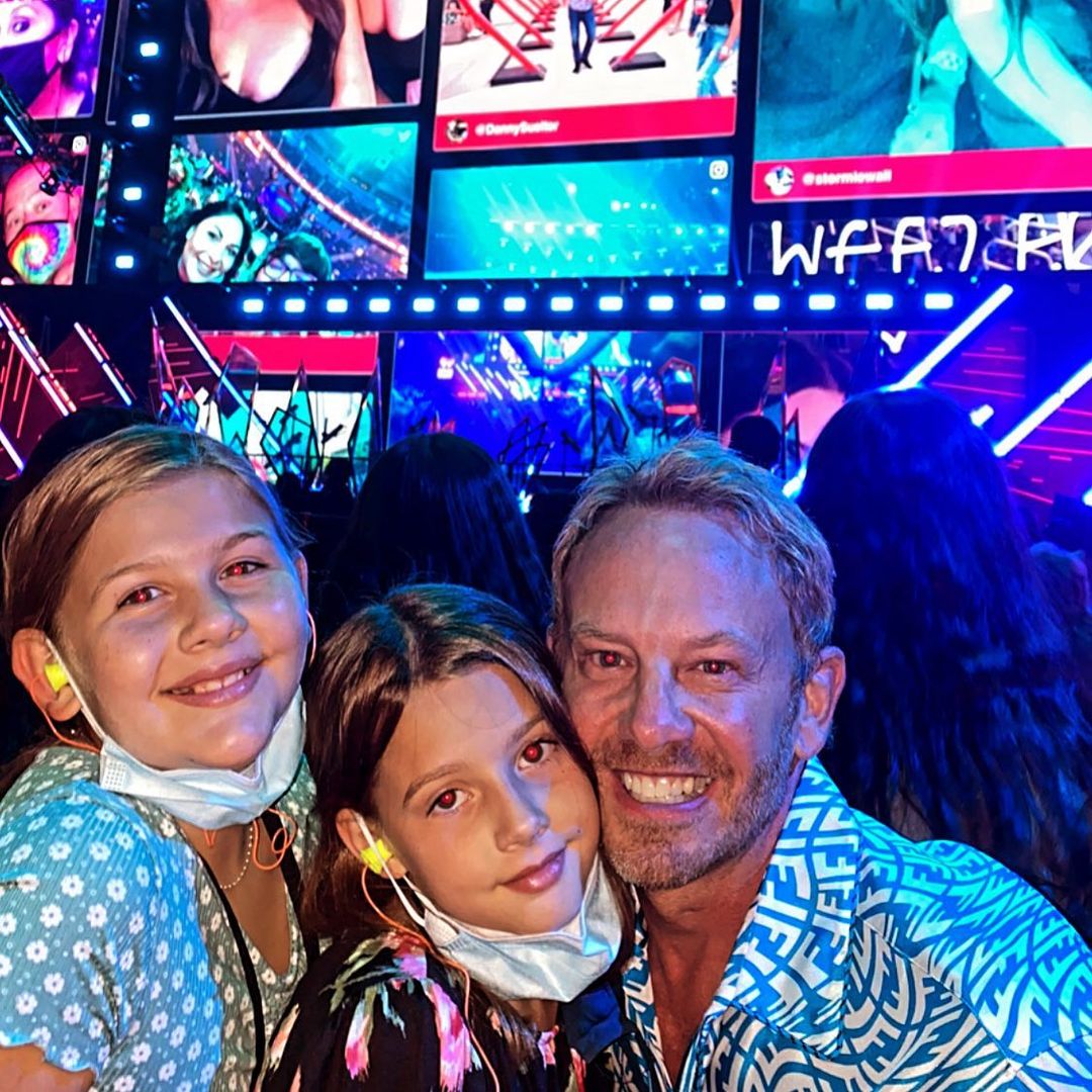 Ian Ziering with his daughters, Mia and Penna, at the iHeartRadio festival.