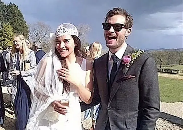 Jamie Dornan with his wife Amelia Warner on their wedding day.