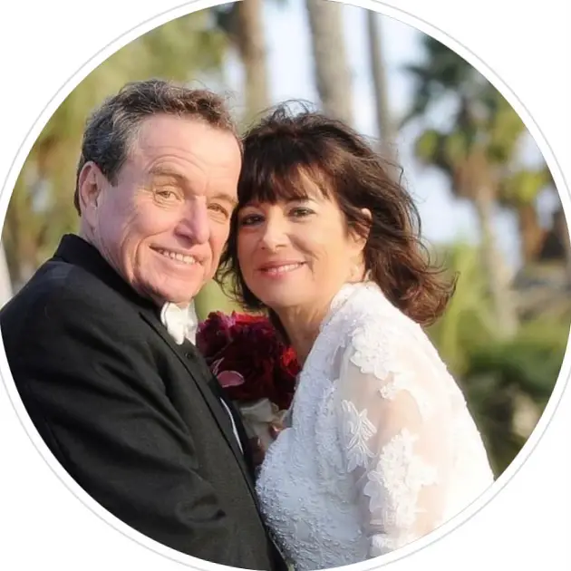 Jerry Mathers with his third spouse, Teresa Modnick, in their wedding outfit.