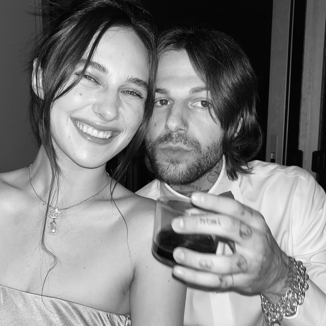 Jesse Rutherford and Devon Lee Carlson posing for a picture.