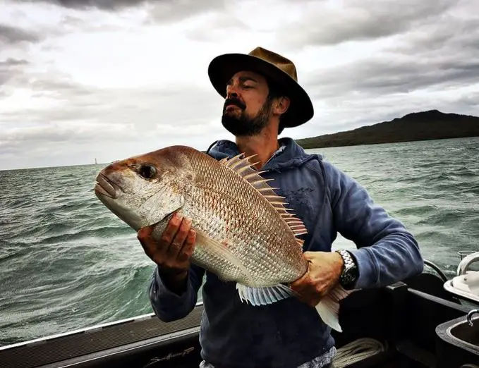Karl Urban showing off his catch
