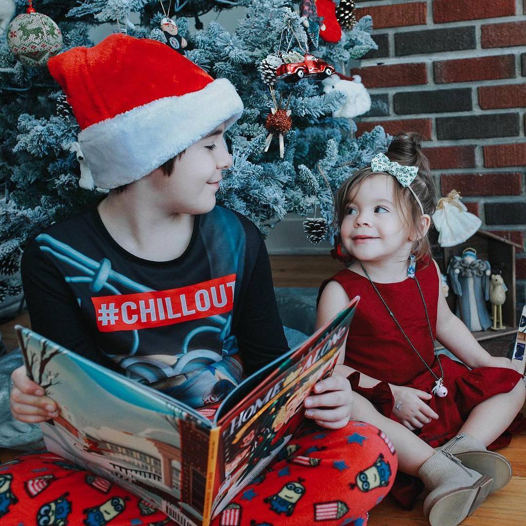 Kevin Owens' kids posing for a photo