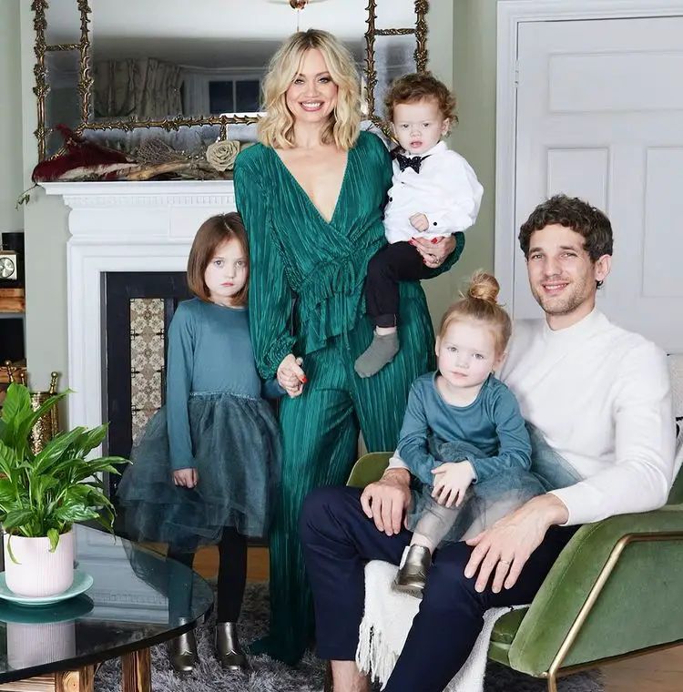 Kimberly Wyatt with her husband Max Rogers and their three children.