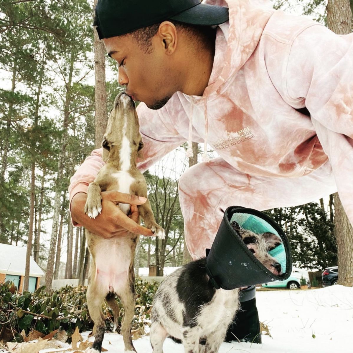 La'Darius Marshall with his two dogs