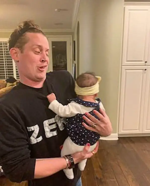 Macaulay Culkin with his son