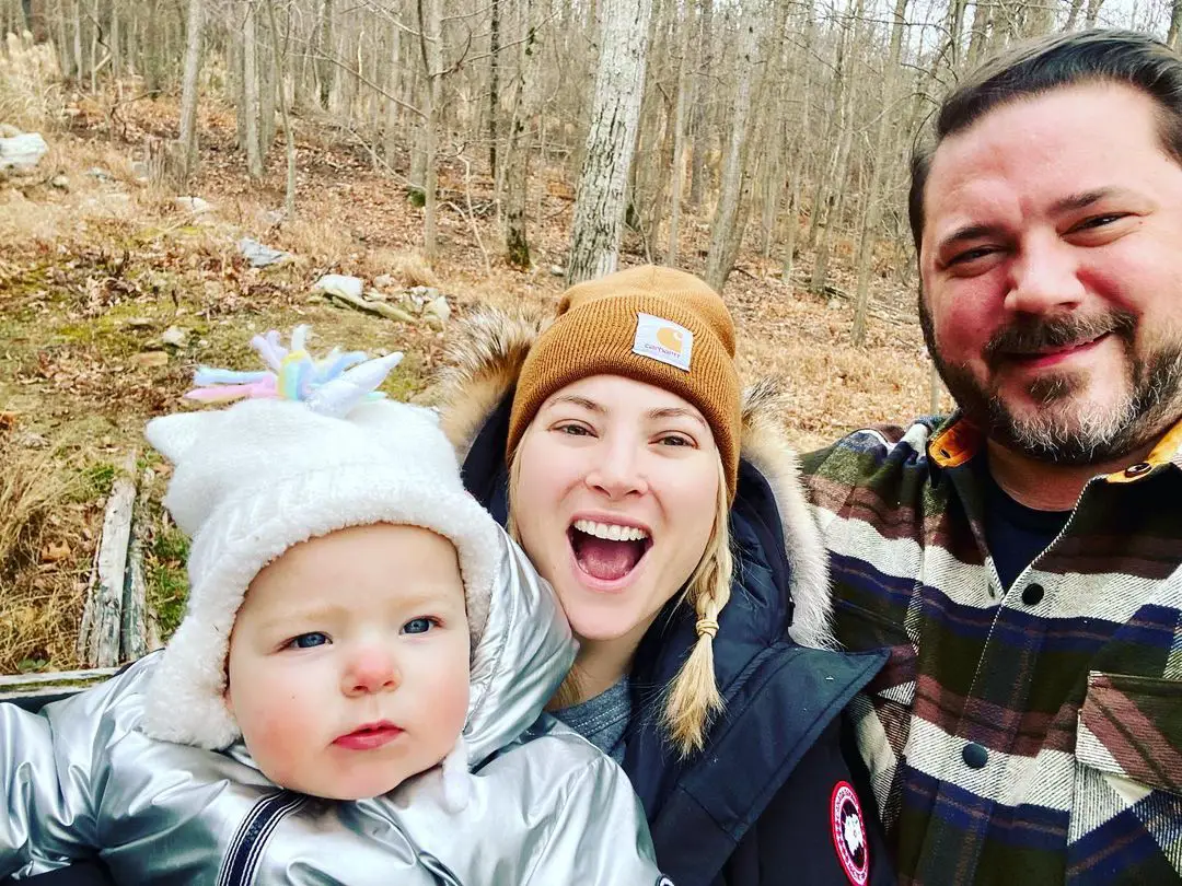 Meghan McCain with her husband Ben Domenech and baby daughter Liberty in December 2021.