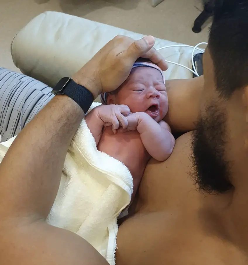 Miesha Tate's husband with their newborn baby boy