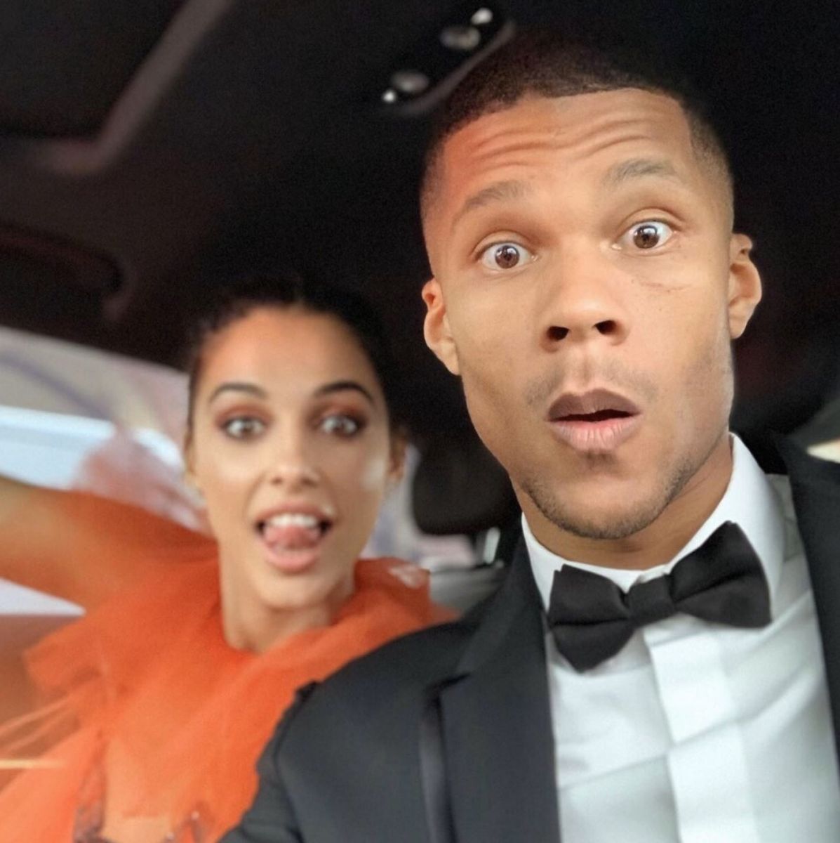 Naomi Scott and her husband Jordan Spence pose for a picture