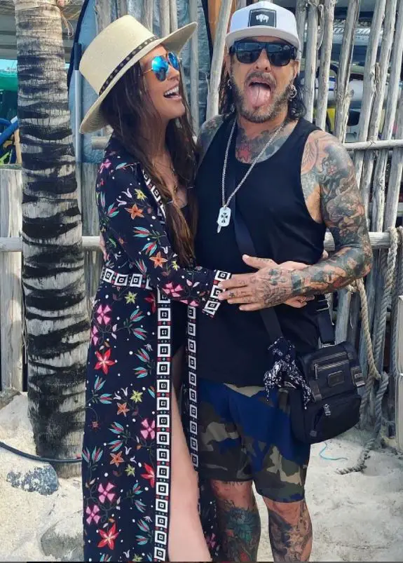 Nikki Sixx and his spouse Courtney Bingham.