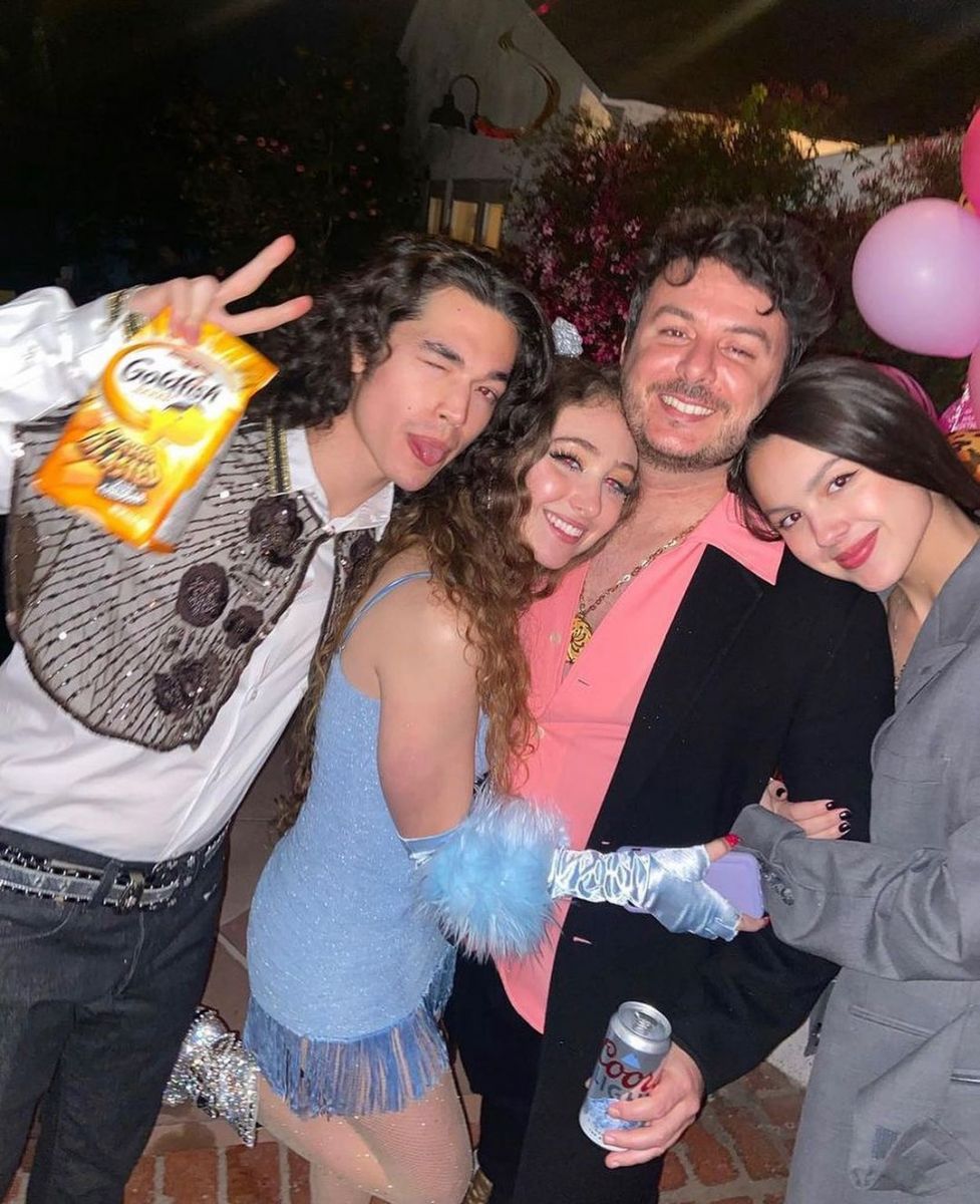 Olivia Rodrigo (right) reportedly wearing Zack Bia's jacket. 