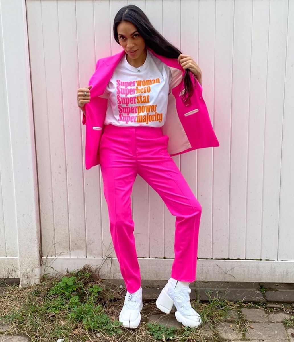 Rosario Dawson, the actress who is proud of her multiracial ethnicity, posing for a picture.