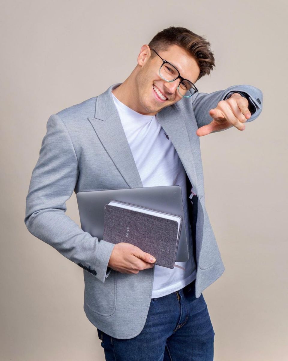 The openly gay content creator promoting his business,Â CrUSHING Social Media.