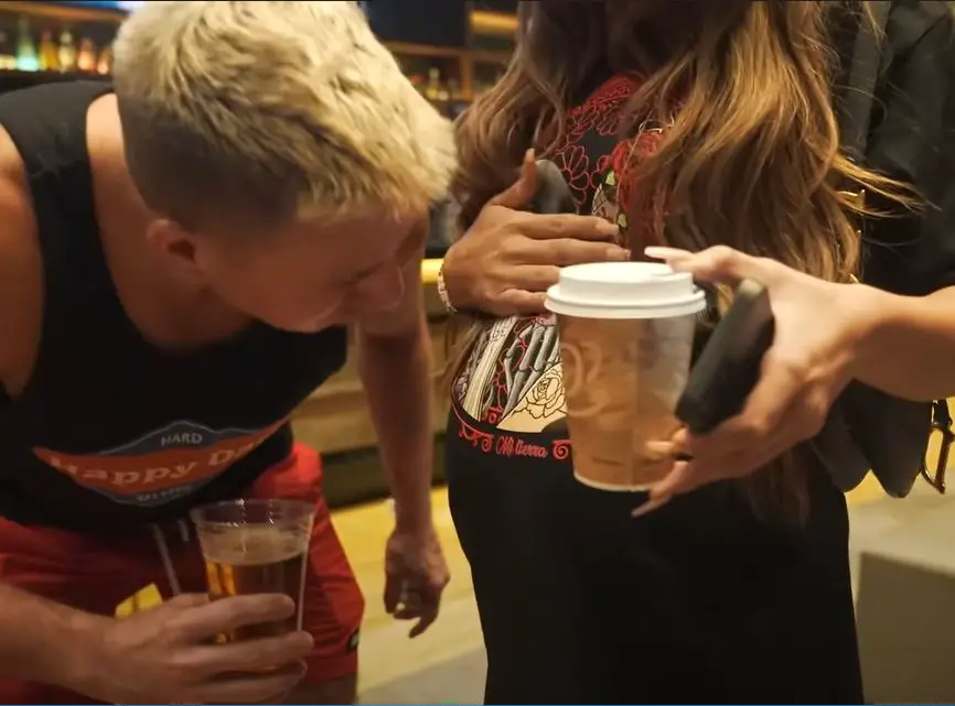 SteveWillDoIt kissing his girlfriend, Celina Smith's baby bump