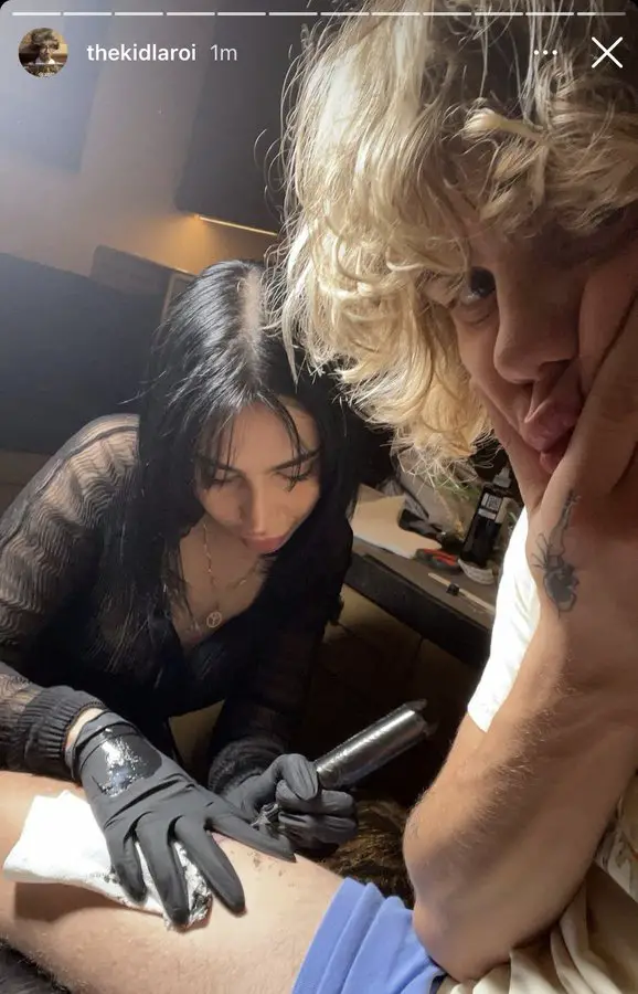The Kid LAROI gets his fourth tattoo, right before his fifth one with Post Malone, in February 2022.
