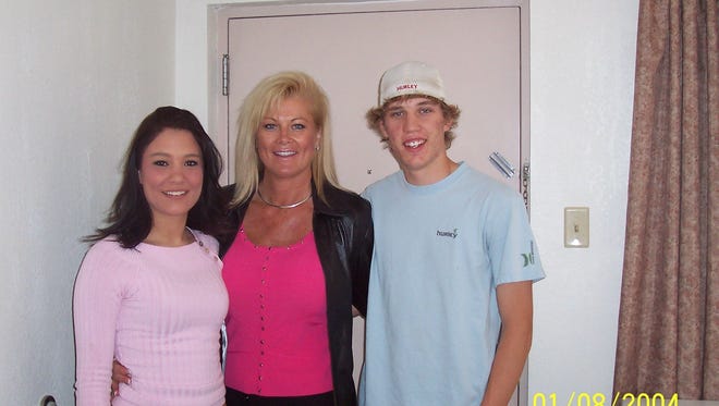Theresa Roemer with her son and daughter