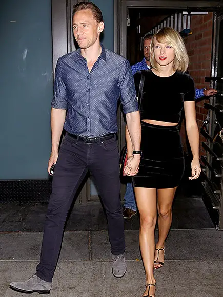 Tom Hiddleston and Taylor Swift holding hands