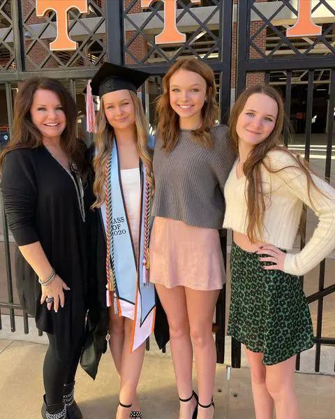 Trace Adkins's children at daughter Mackenzie's graduation in October 2020.