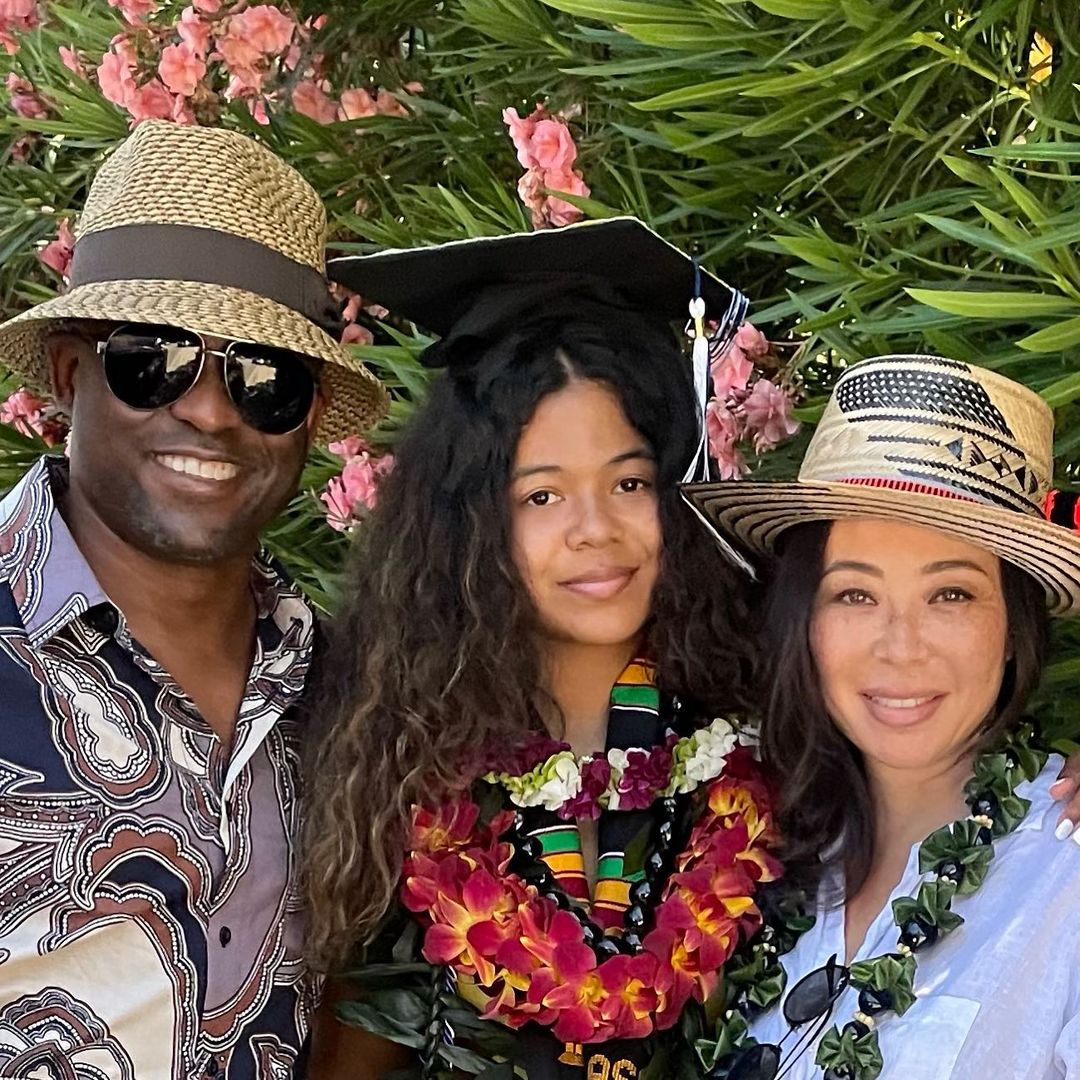 Wayne Brady with ex-wife Mandie Taketa and daughter Maile posing for a pict...