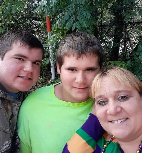 Willie Edwards' wife with her two sons