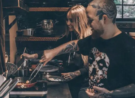 Fiona Guichon making breakfast with a friend