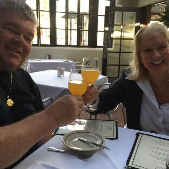 Diane Ladd enjoying a lunch with her spouse Robert Charles Hunter in 2014.