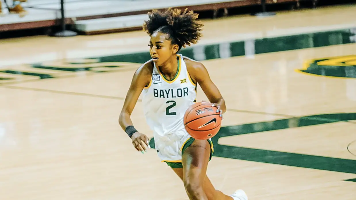 DiDi Richards on the basketball court following her recovery