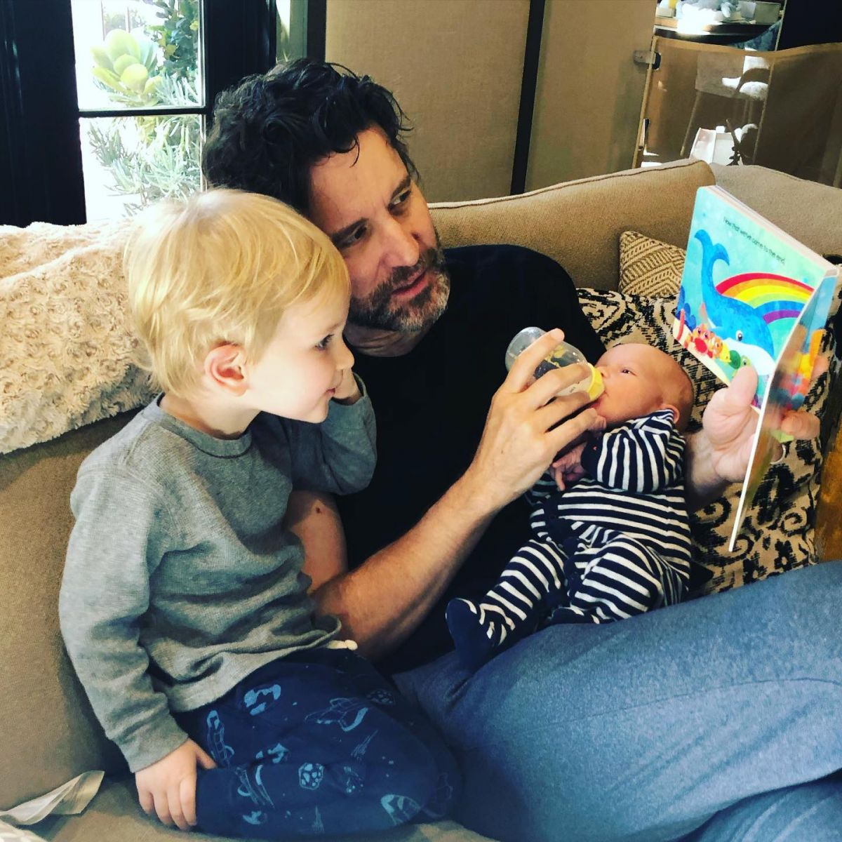Chelsey Crisp's husband Rhett Reese with their two children.