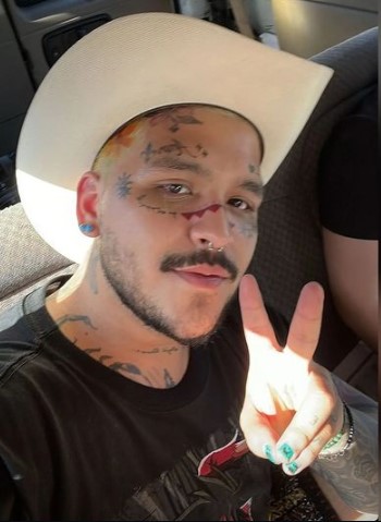 Christian Nodal shows off his new look with a new face tattoo.