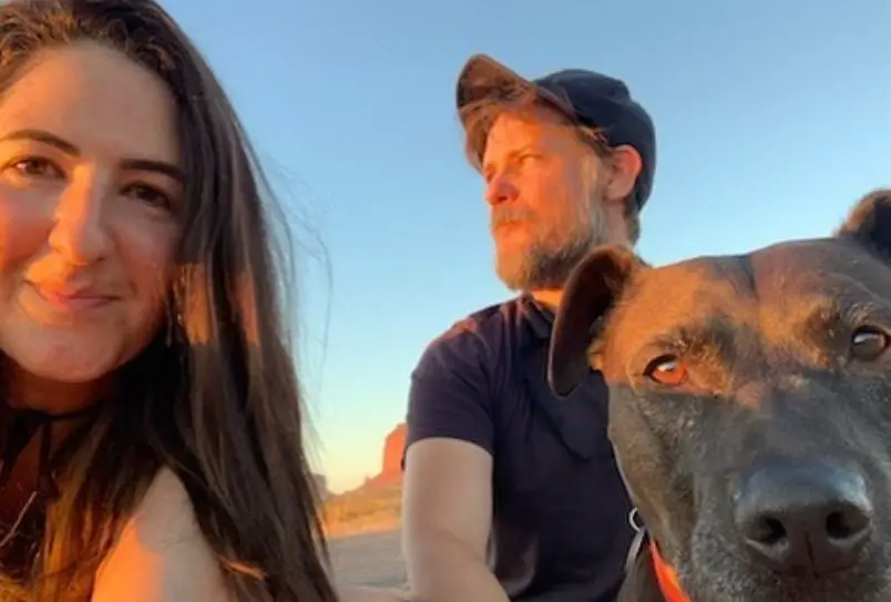 D'Arcy Carden and her husband with their adopted dog, Penny