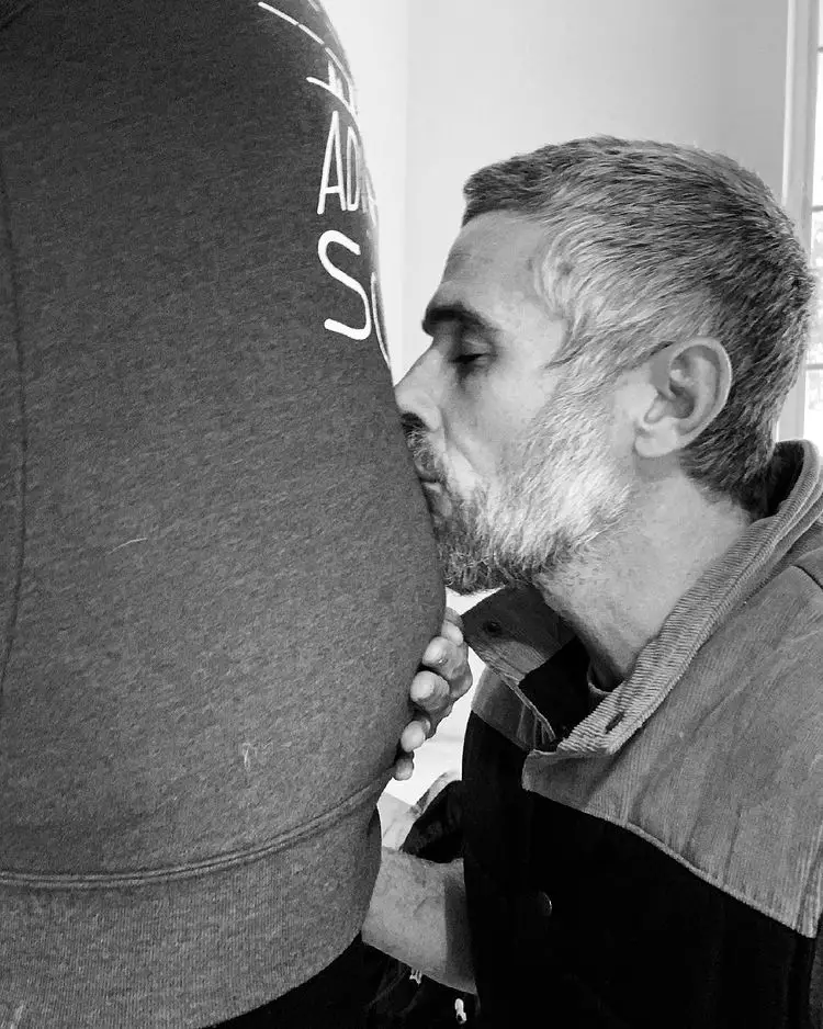 Dave Annable kissing his wife's belly before her miscarriage.