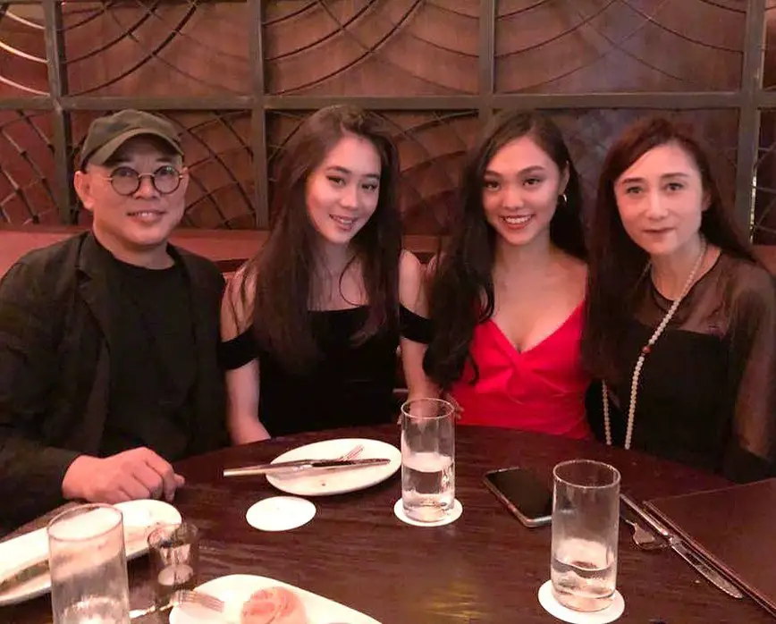 Jet Li with his daughters, Jane and Jada, and is second wife, Nina Li Chi