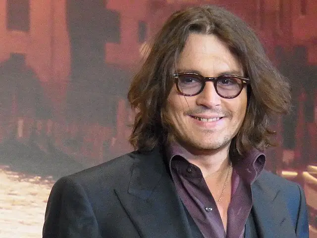 Johnny Depp with his gold teeth at the Tourist Premiere in Tokyo in 2011.