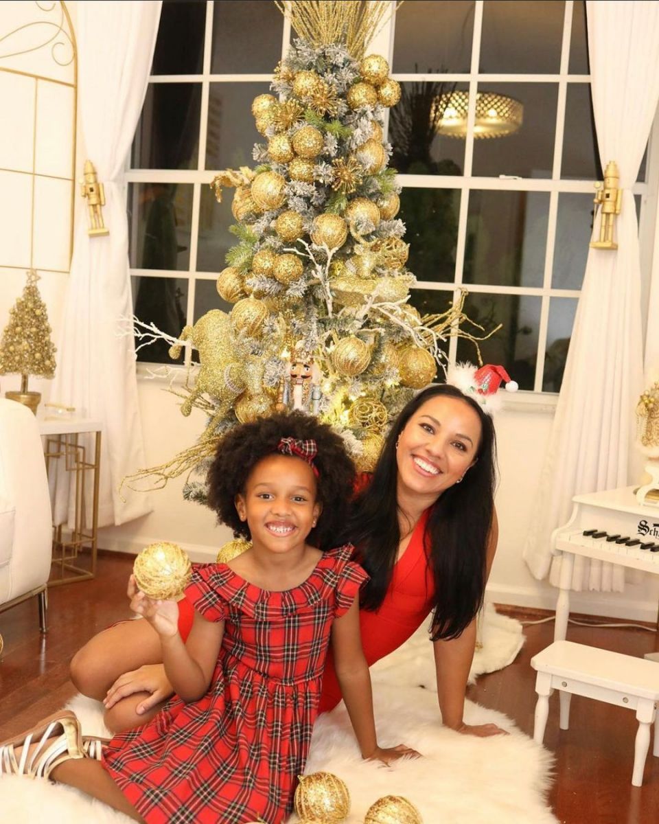 Kamaru Usman's wife, Eleslie Dietzsch,Â and daughter, Samirah, posing for a photo