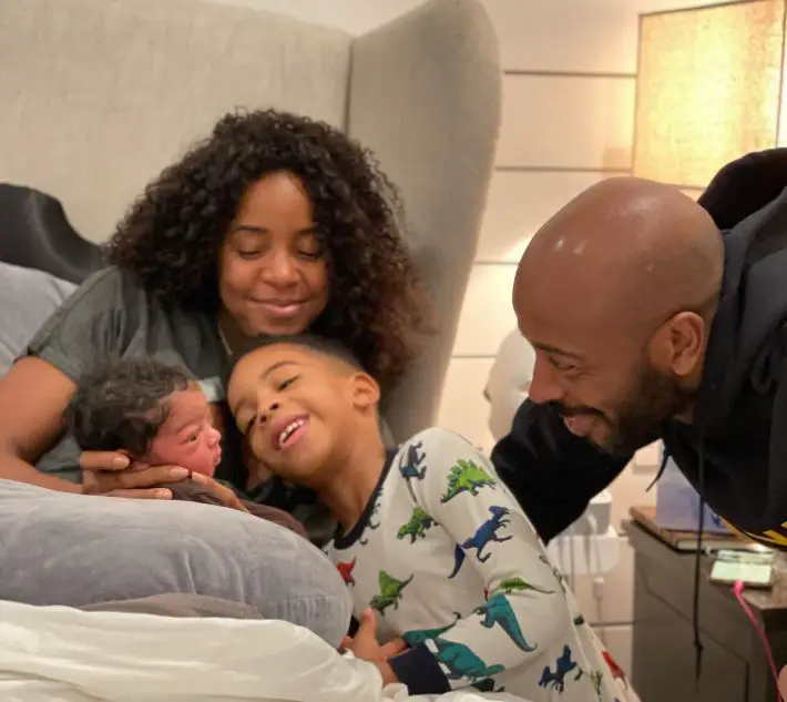 Kelly Rowland and her husband with their older son and his baby brother