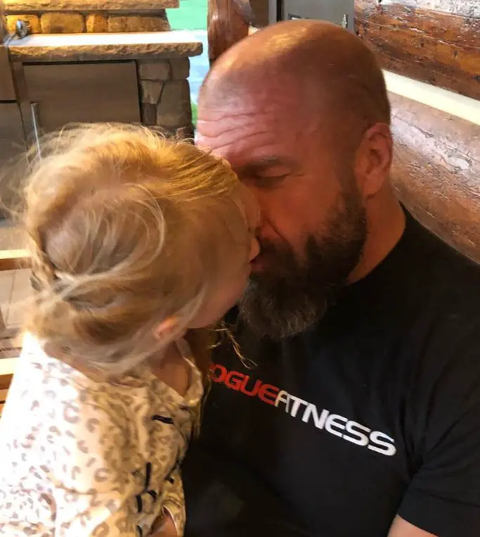 Stephanie McMahon's husband with their daughter on Father's Day