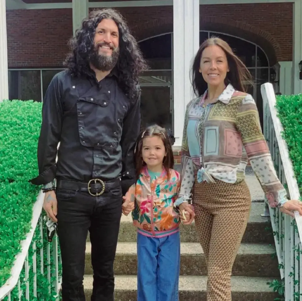 Tommy Clufetos with his wife, Casey Clufetos, and their daughter June Grace.