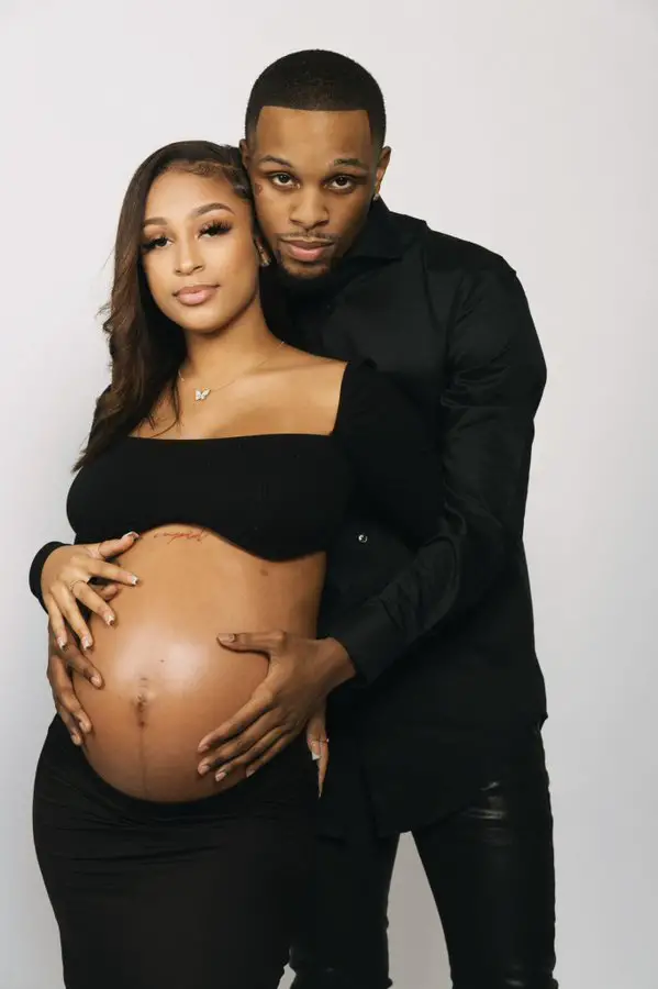 Toosii and his girlfriend, Samaria Davis, show off their baby bump after announcing they are pregnant with their first kid.