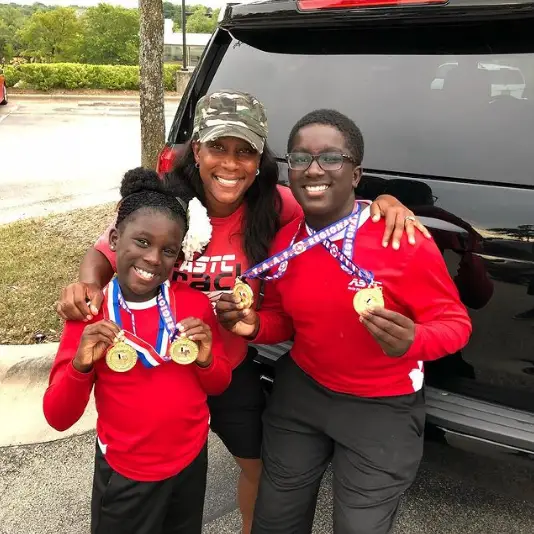 Mark Henry's wife Jana Henry and kids going to the Jr. Olympics.